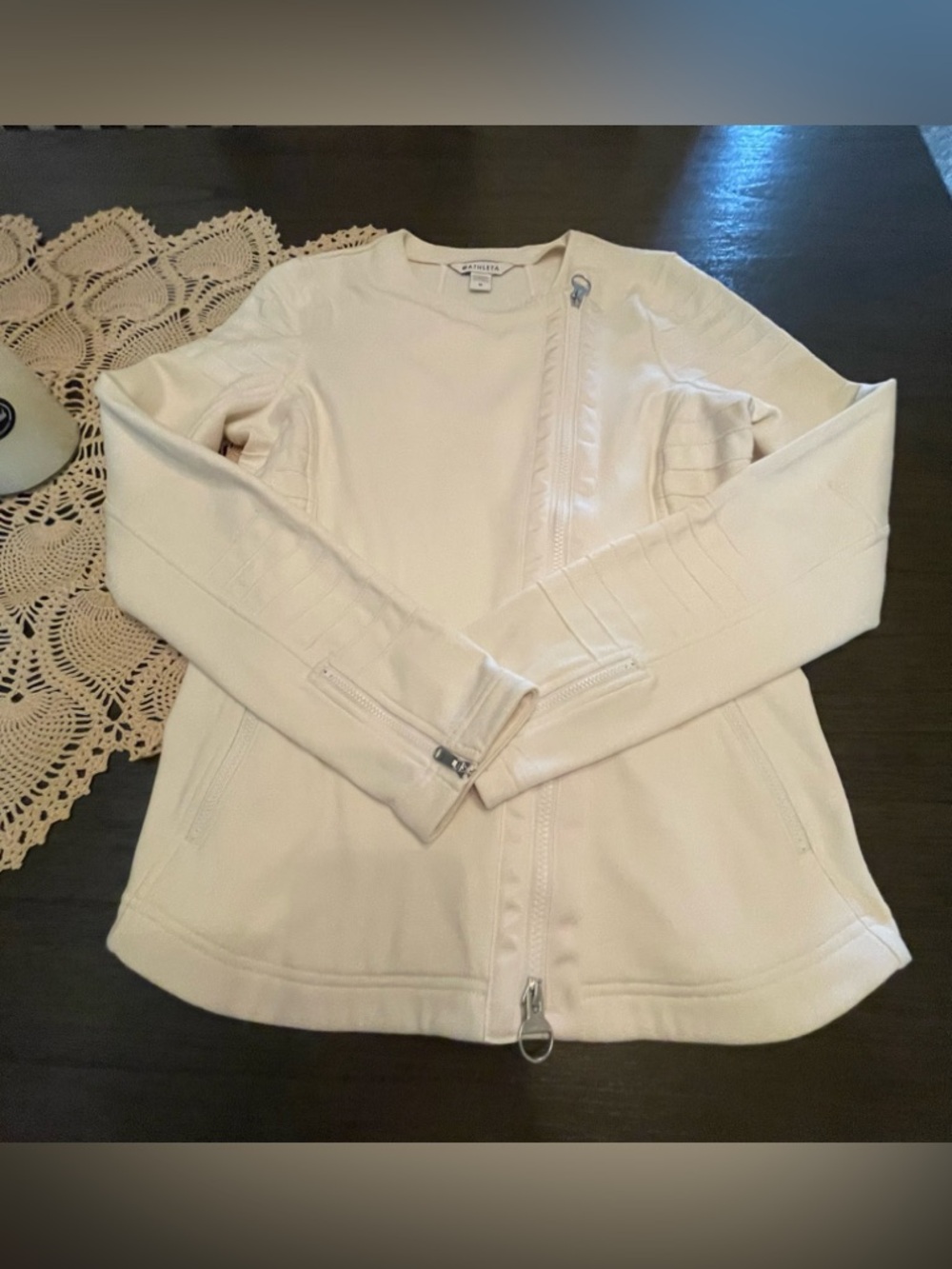 Athleta Dual Front Zip Up Moto Jacket in a ivory color.